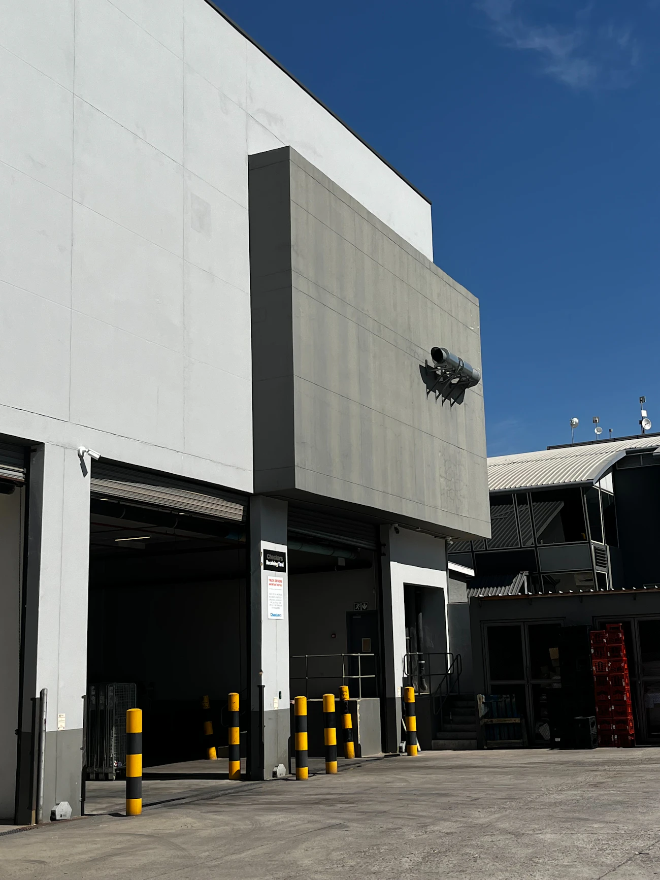 Concrete facade and loading bays of a commercial property